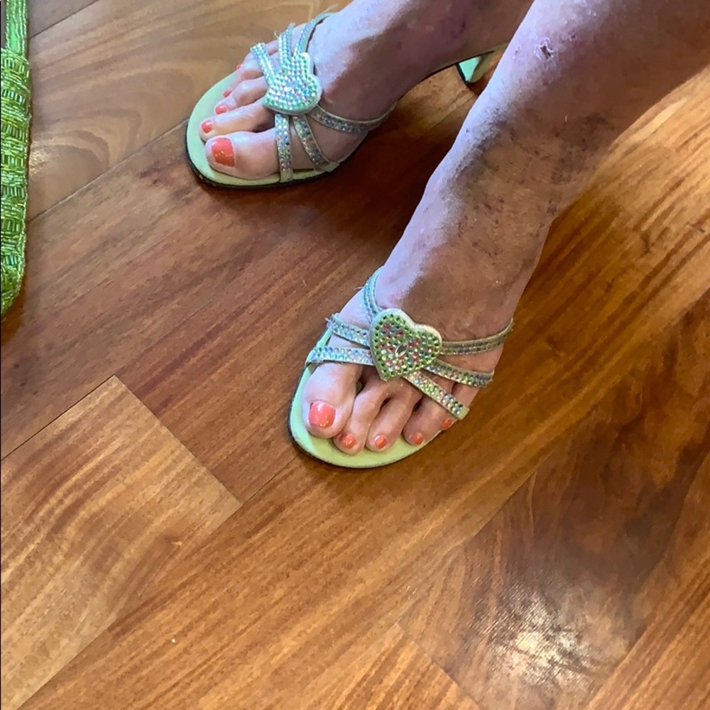 Dezario Green and rhinestone slide in sandals.